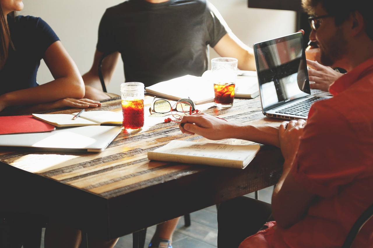Meeting, brainstorming, business — The Price vs. Benefit Breakdown of Renters Insurance in NC