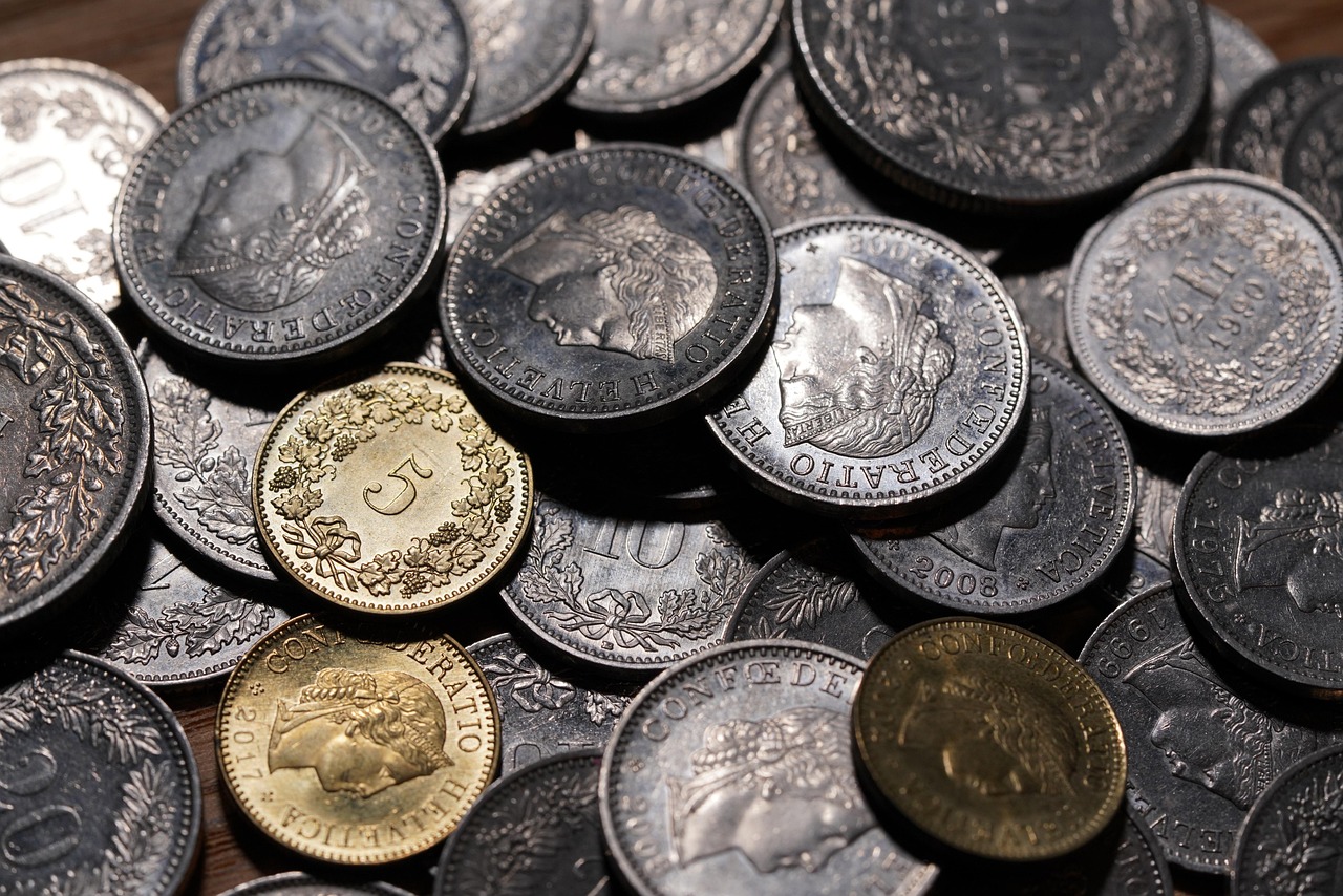 Money, swiss francs, coins — Things to Remember in Case of Car Accidents