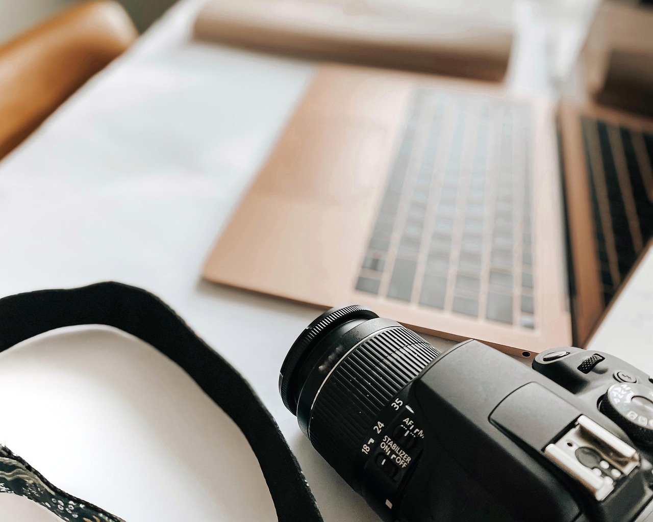 Laptop, camera, desk — What Are Some Good Books About Franchise Businesses?