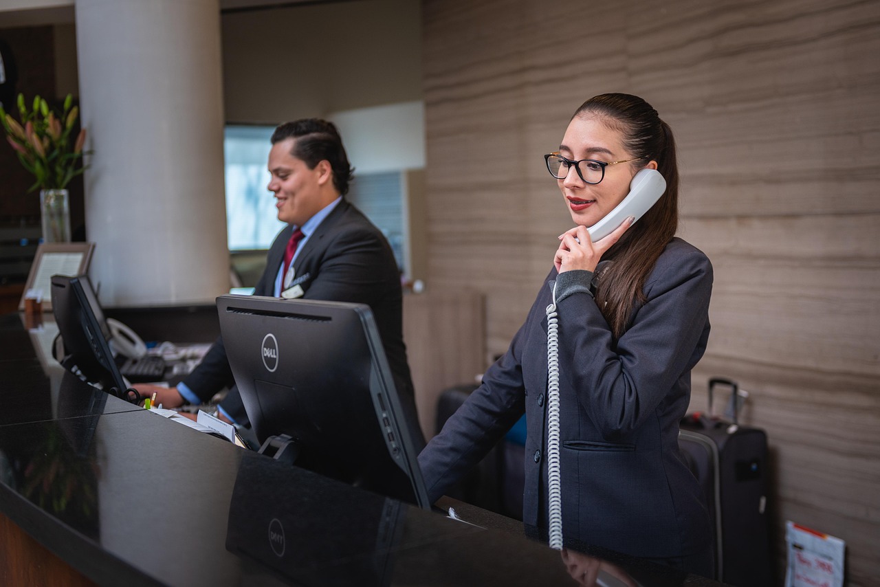 Receptionists, phone call, hotel — What Are The Five Types Of People Entering Hong Kong For Business Purposes?